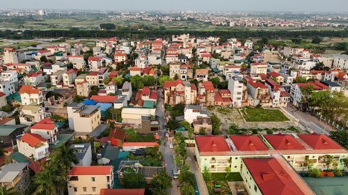 Việc chuyển đổi từ đất trồng cây lâu năm sang đất ở đúng pháp luật sẽ giúp các hộ dân ổn định cuộc sống lâu dài. Ảnh: Quang Vinh