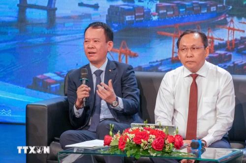 Phó Tổng Thư ký Liên đoàn Thương mại và Công nghiệp Việt Nam (VCCI) Phạm Đình Vũ chia sẻ tại tọa đàm. (Ảnh: Thanh Liêm/TTXVN)