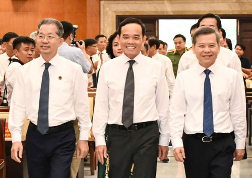 Các đại biểu tham dự chương trình kỷ niệm 50 năm Ngày thành lập TAND hai cấp TPHCM. Ảnh: VIỆT DŨNG