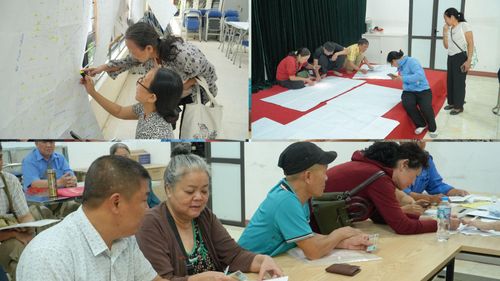 Người dân tại các tổ dân phố trên địa bàn phường Thanh Xuân được hướng dẫn rà soát, đối chiếu và cập nhật dữ liệu đất đai. Ảnh: Tùng Lâm