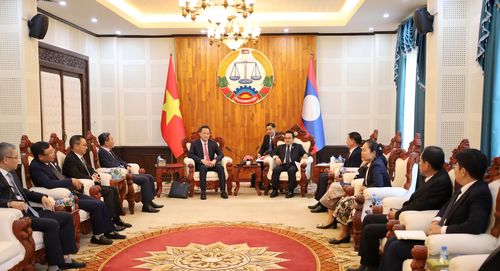 Quang cảnh buổi làm việc giữa Tổng Kiểm toán nhà nước Việt Nam Nguyễn Hữu Nghĩa và Chủ tịch KTNN Lào Viengthavison Thephachanh. Ảnh: KTNN Lào