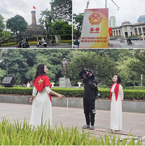 Sắc đỏ cờ Tổ quốc và các cụm trang trí xuất hiện tại nhiều địa điểm trung tâm Thủ đô. Ảnh: T.Anh