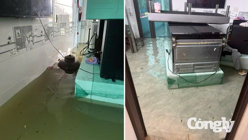 Nước ngập vào nhà, người dân ở thôn Kênh Gà đã chủ động di chuyển tài sản, vật dụng lên vị trí cao.