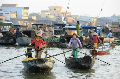 Nhân ái, hào hiệp và trọng nghĩa khinh tài là những phẩm chất nổi bật của người Nam Bộ. Ảnh: Nguyễn Thắng/ Báo ảnh Việt Nam.