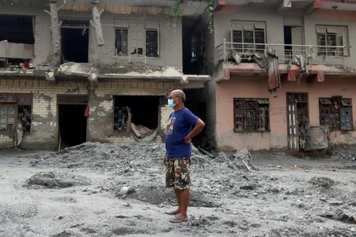 Hậu quả sau vụ sập sông băng gây ra lũ quét ở biên giới Nepal-Trung Quốc. Ảnh: Reuters.