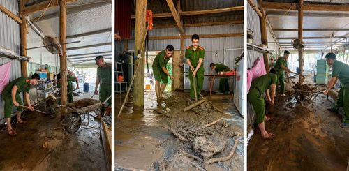 Lực lượng Công an di chuyển đất, đá tràn vào nhà gia đình ông Đào Văn Quỳnh.