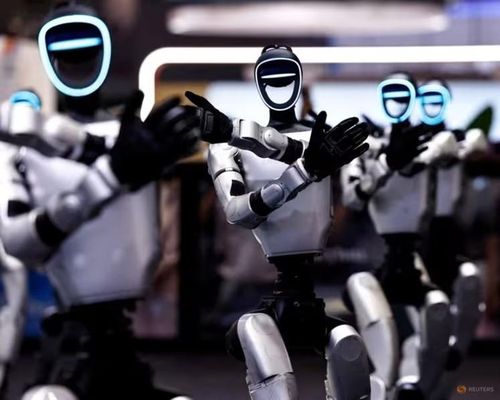 Robot hình người của Unitree Robotics trình diễn múa tập thể tại Hội nghị Robot Thế giới 2026 ở Bắc Kinh, Trung Quốc. Ảnh: REUTERS/Tingshu Wang.
