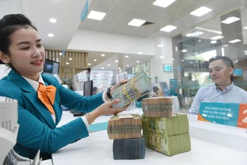 Thanh khoản ngân hàng cải thiện nhưng dư địa giảm lãi vay còn hạn chế. (Ảnh: Vietnam+)