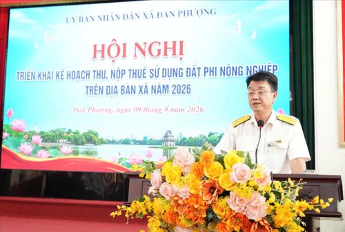 Lãnh đạo Thuế cơ sở 24 thành phố Hà Nội trao đổi tại hội nghị. Ảnh: Ngân Nguyễn