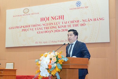 Ông Bạch Thành Long, Phó Tổng Giám đốc Vietcombank phát biểu tại Hội nghị