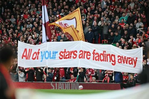 Sức ép từ khán đài Anfield vẫn không thể ngăn Man City đánh bại Liverpool. Ảnh: AFP.