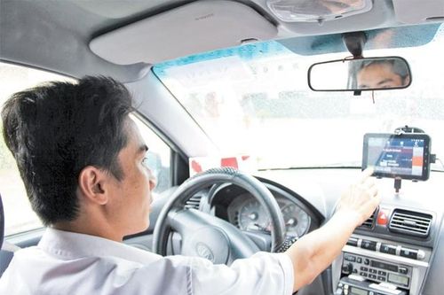 Vì sao nhiều hãng ta-xi tẩy chay Grab ta-xi?