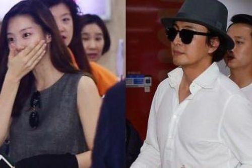Vợ chồng Bae Yong Joon người trước kẻ sau ở sân bay