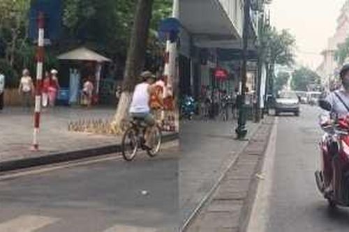 Xe đạp, xe máy vẫn phóng ầm ầm trên phố đi bộ hồ Hoàn Kiếm