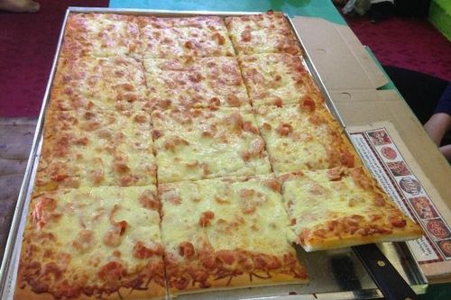 Ăn bánh pizza trong 37 phút, nhận 5 triệu đồng