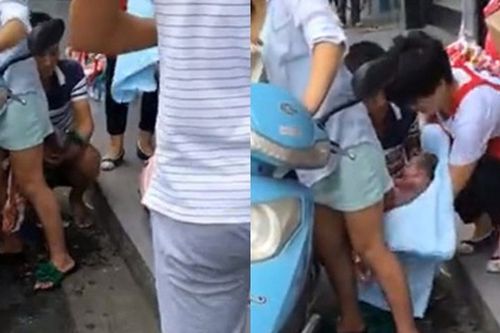 Bà bầu sinh con trên đường khi đang lái xe máy