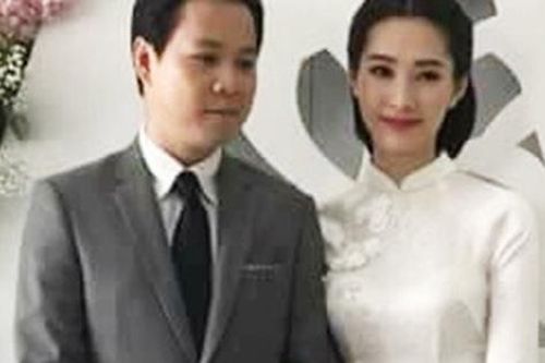 Hoa hậu Đặng thu Thảo nền nã áo dài trắng trong đám hỏi
