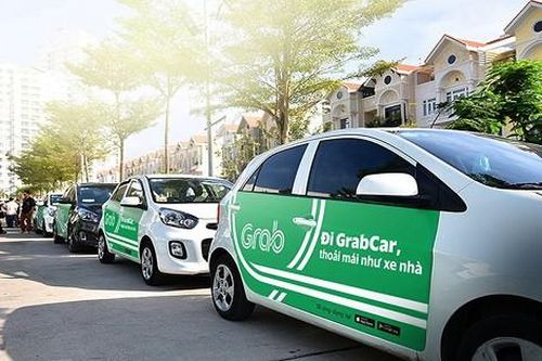 Bộ GTVT đốc thúc hãng xe Uber, Grap dán logo