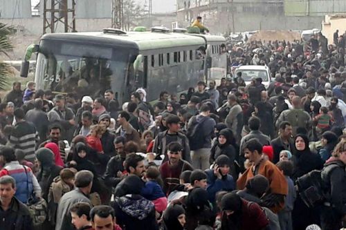 Hàng loạt tay súng thánh chiến Syria đầu hàng, gần 80.000 dân thường thoát khỏi tử địa Đông Ghouta