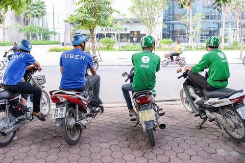 Thương vụ Grab mua Uber có dấu hiệu vi phạm pháp luật