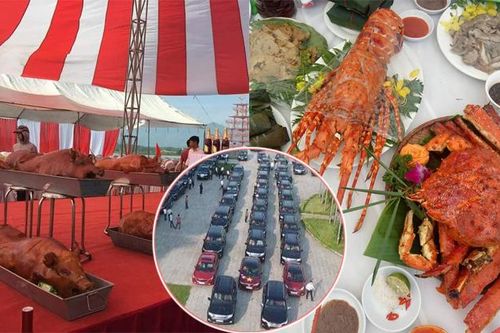 Choáng với cỗ cưới toàn tôm hùm, cua hoàng đế và lợn quay nguyên con cùng dàn xe 150 chiếc đón dâu của đại gia Hà thành
