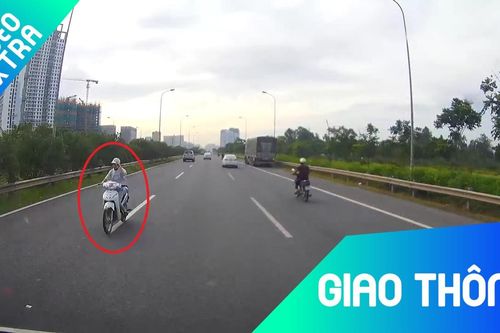Cô gái vừa đi ngược chiều vừa nghe điện thoại trên cao tốc