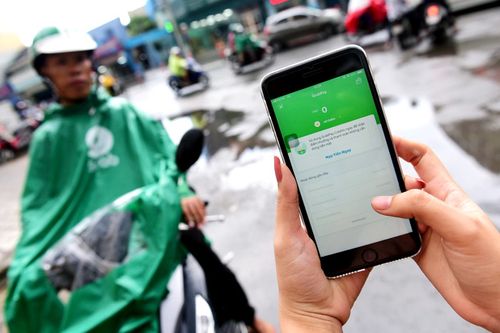 Grab 'phong tỏa' tiền dân, thu thập thông tin khách hàng