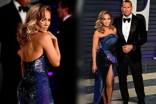 Jennifer Lopez diện đầm xẻ cao quyến rũ bên tình trẻ tại tiệc Oscar