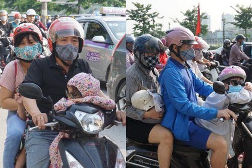 Trẻ nhỏ nằm gục trên xe máy cùng bố mẹ quay lại Hà Nội sau kỳ nghỉ lễ 30/4