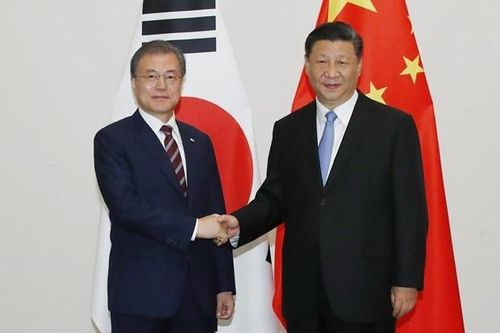 Ông Tập xác nhận Kim Jong Un quyết tâm phi hạt nhân