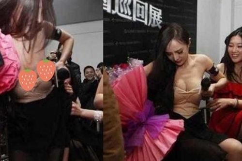 Dương Mịch thể hiện bản lĩnh ngôi sao khi bị fan kéo tụt váy trước công chúng