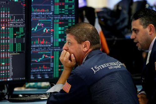 Chứng khoán Mỹ rớt điểm vì dự báo lãi suất FED gây thất vọng