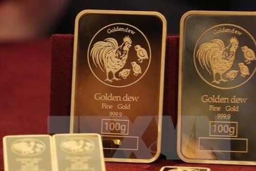 Vàng châu Á vững giá trước thềm cuộc họp của Fed