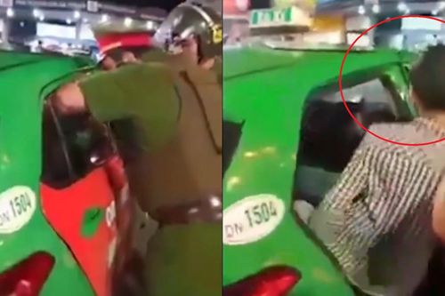 Hai tên cướp bị tài xế khóa cửa, nhốt trong taxi ở Đồng Nai