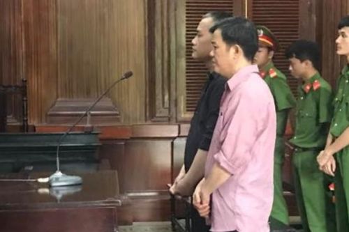 Vào tù vì mang 100.000 USD tiền giả đến ngân hàng đổi