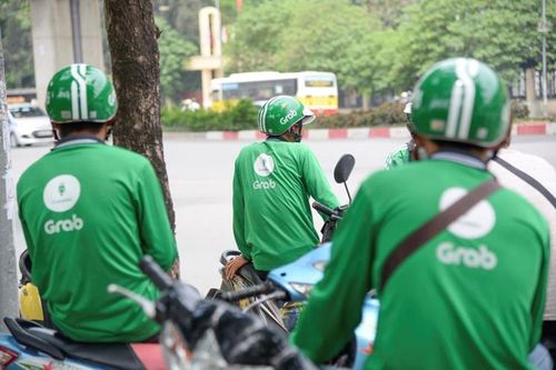 Thu hộ thuế cho đối tác tài xế, Grab chịu áp lực 'trên đe, dưới búa' (!)