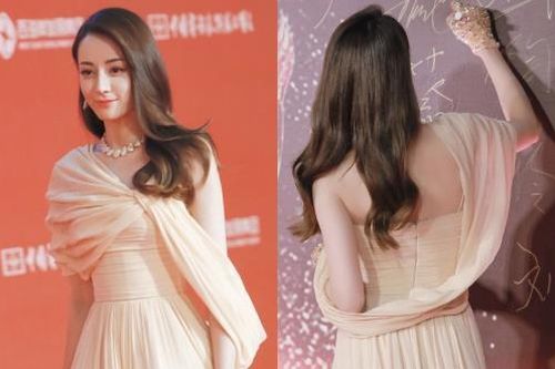 'Mỹ nữ Tân Cương' Địch Lệ Nhiệt Ba khoe lưng trần trên thảm đỏ