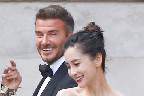 David Beckham và Angelababy cười tươi khi quay quảng cáo trên phố