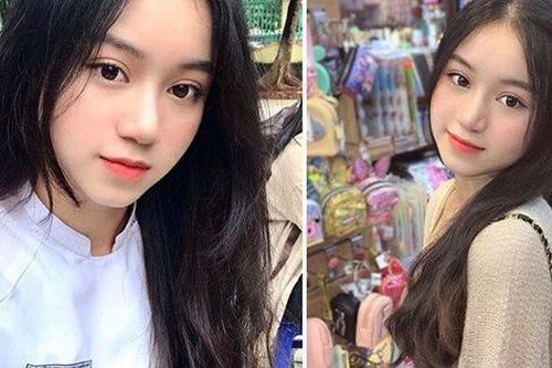 Lớp phó học tập diện áo dài trắng xinh nổi bật trong lễ chào cờ