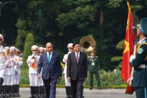 Lễ đón Thủ tướng CHDCND Lào Thongloun Sisoulith thăm chính thức Việt Nam