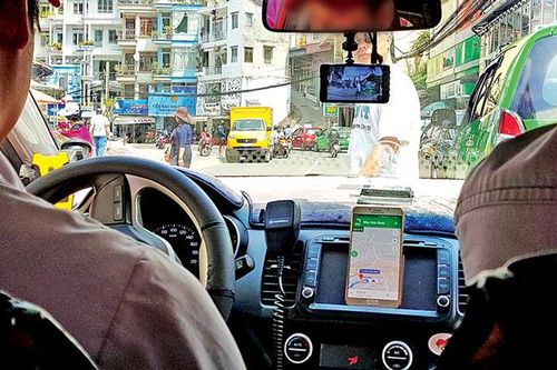 Cho phép triển khai thí điểm Grab taxi nhưng kiểm soát chặt chẽ