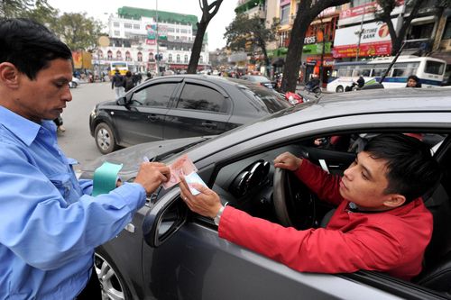 TP.HCM tính chuyện phạt nguội ôtô không trả phí đậu xe