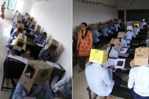 Nhà trường phải xin lỗi vì cho học sinh đội hộp các-tông làm bài thi