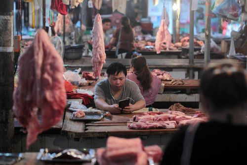 Các nhà hàng Trung Quốc khốn khổ vì giá thịt lợn tăng 160%