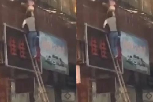 Bé trai nghịch ngợm khiến đầu bị kẹt, cả người lơ lửng ngoài ban công