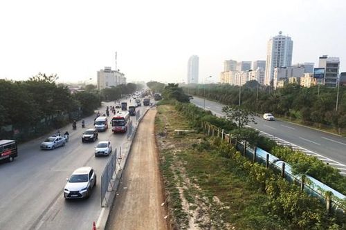Xén dải phân cách, mở rộng thêm 4 làn xe đường gom Đại lộ Thăng Long