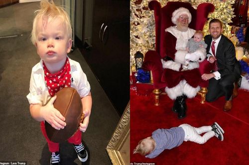 Chụp ảnh cùng ông già Noel, cháu trai TT Trump ngủ gục ra sàn
