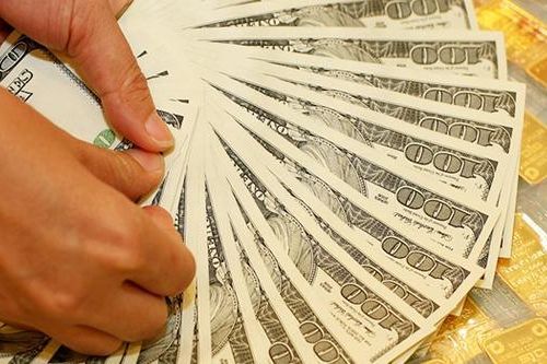 Giá vàng và USD đồng loạt giảm giá