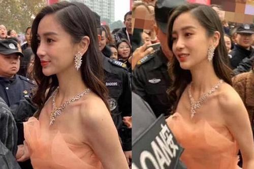 Bất chấp thời tiết cắt da cắt thịt, Angela Baby vẫn quyết diện đầm hở bạo lộ ngực gầy đến xót xa