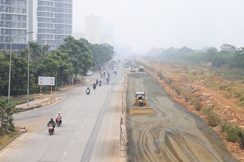 Gấp rút xén dải phân cách Đại lộ Thăng Long